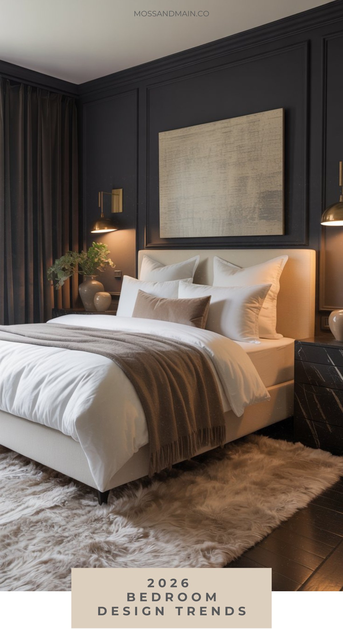 A modern bedroom with dark walls, neutral bedding, a beige upholstered bed, taupe and white pillows, a cozy blanket, bedside lamps, a textured rug, and minimalist wall art showcases the latest bedroom design trends. Text reads “2026 Bedroom Design Trends.”.