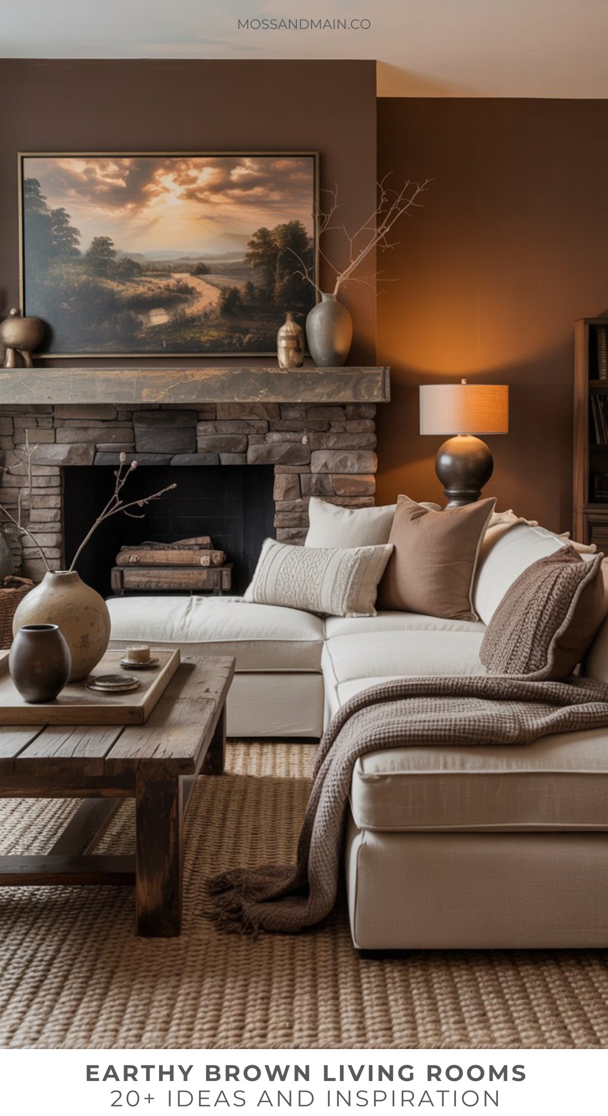 A cozy brown living room with earthy tones, featuring a stone fireplace, a landscape painting, a beige sectional sofa with pillows and a throw blanket, a wooden coffee table, and neutral decor items proves that brown is the new black. Warm ambient lighting.