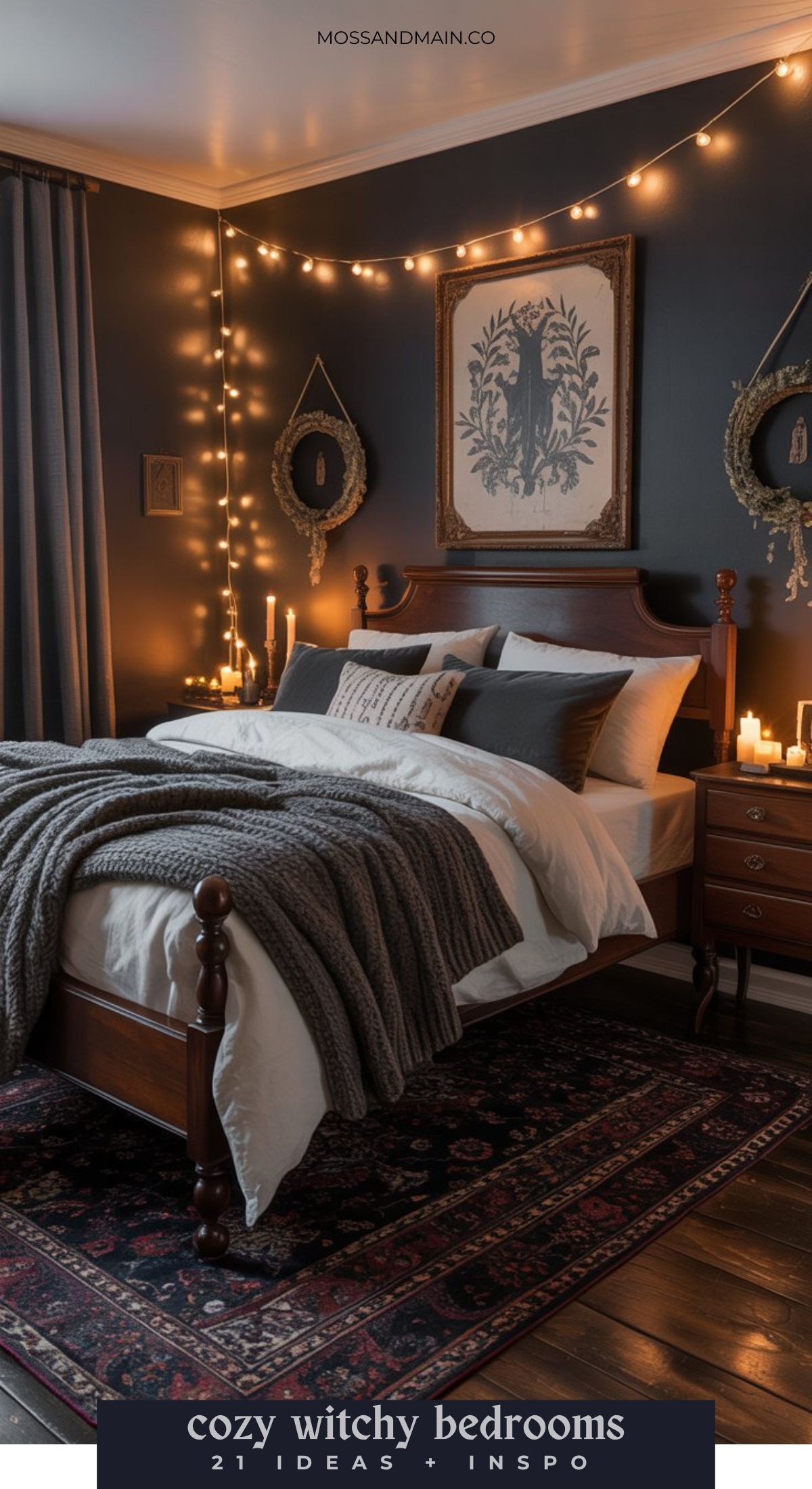 A dark, cozy bedroom with string lights, candles, and gothic decor. The bed has gray blankets and pillows, while framed art and mirrors on the walls create a magical hideaway full of witchy bedroom ideas and mystical charm.