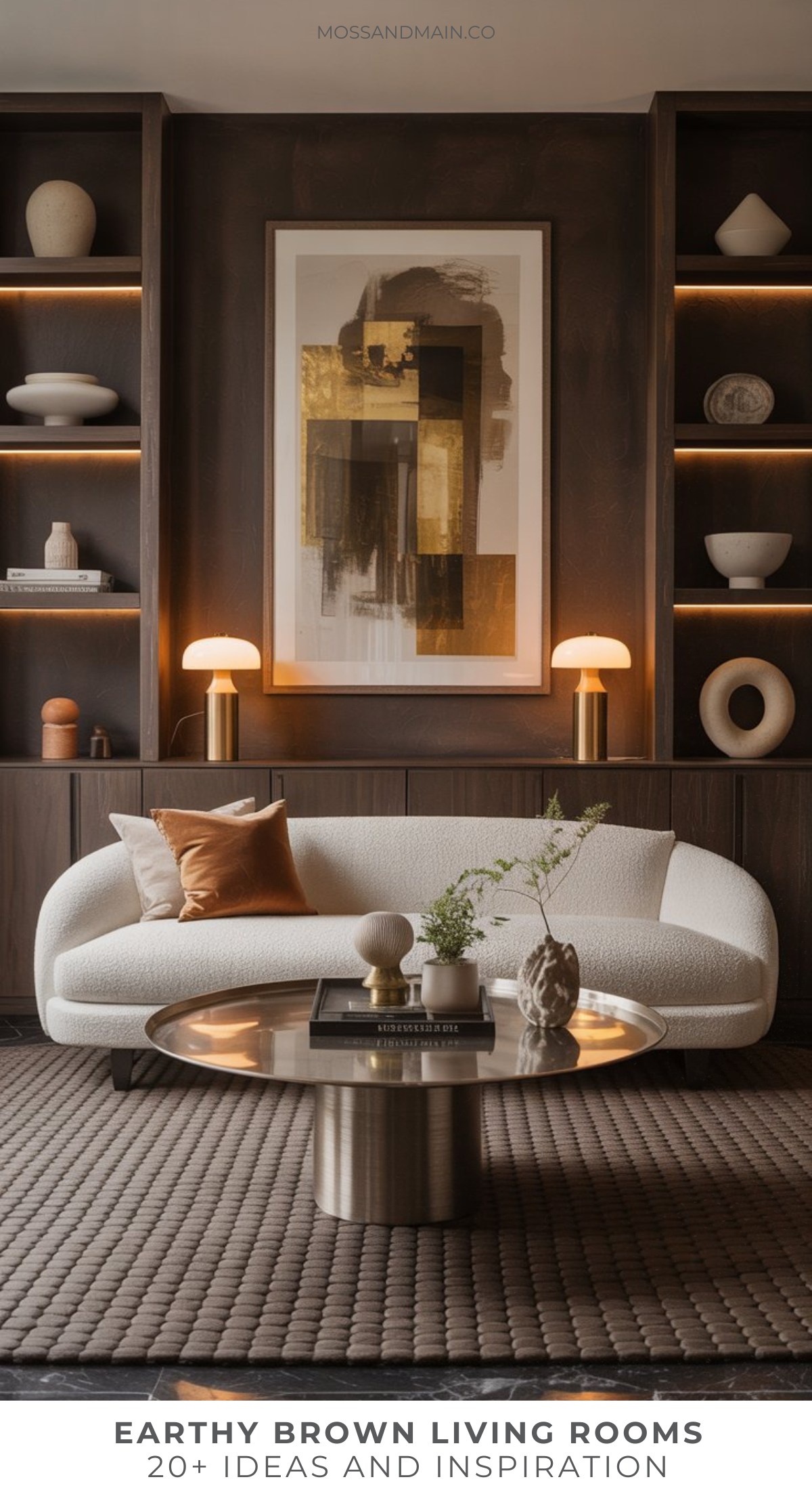 A modern brown living room with a white curved sofa, round coffee table, earthy-toned decor, abstract wall art, and built-in dark wood shelves displaying vases and sculptures. Warm lighting adds a cozy ambiance.