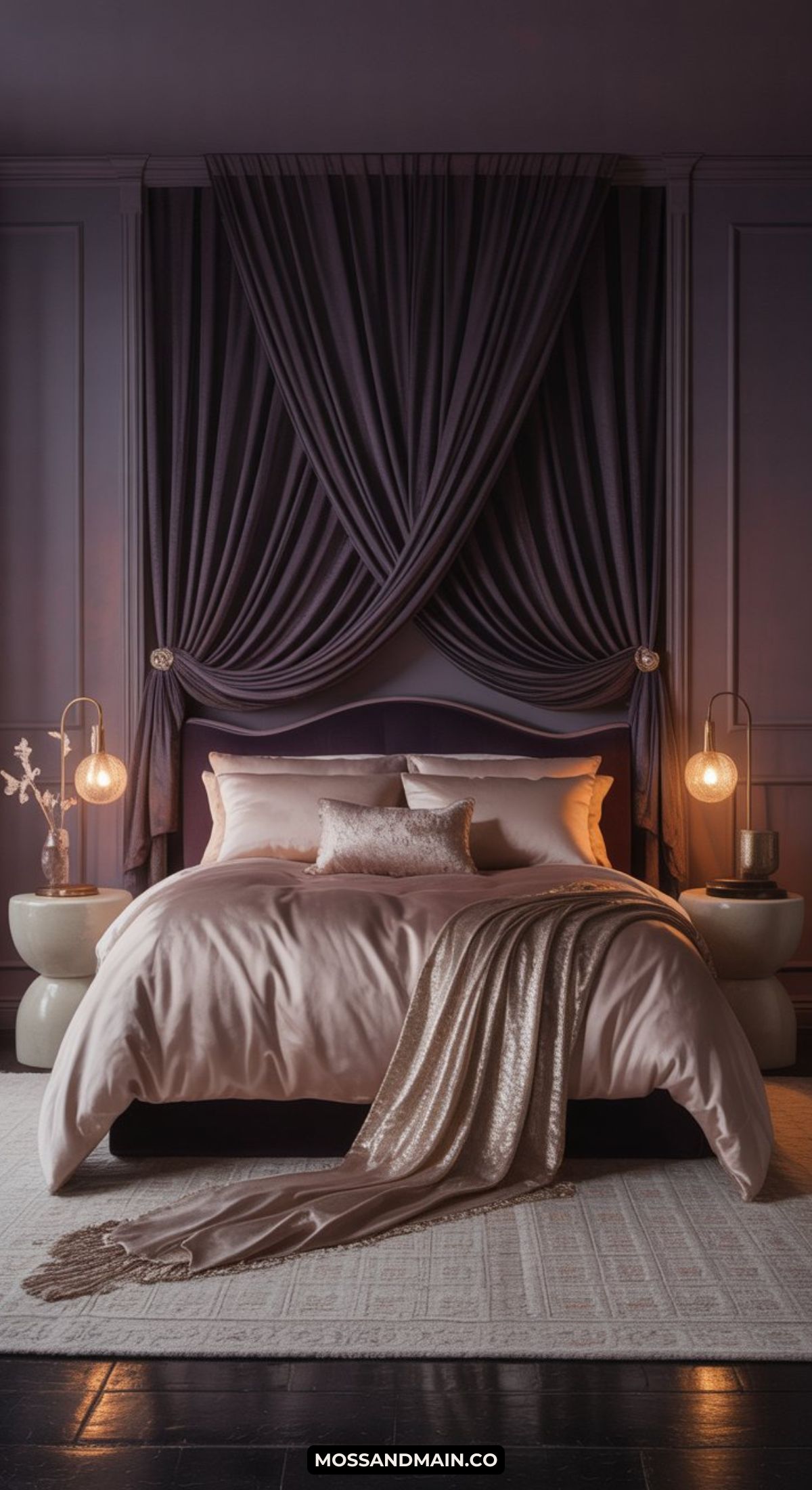A masquerade bedroom features a large bed with pale pink bedding, decorative pillows, and a gold throw. Dramatic dark drapes frame the headboard, while globe pendant lights hang above round bedside tables.