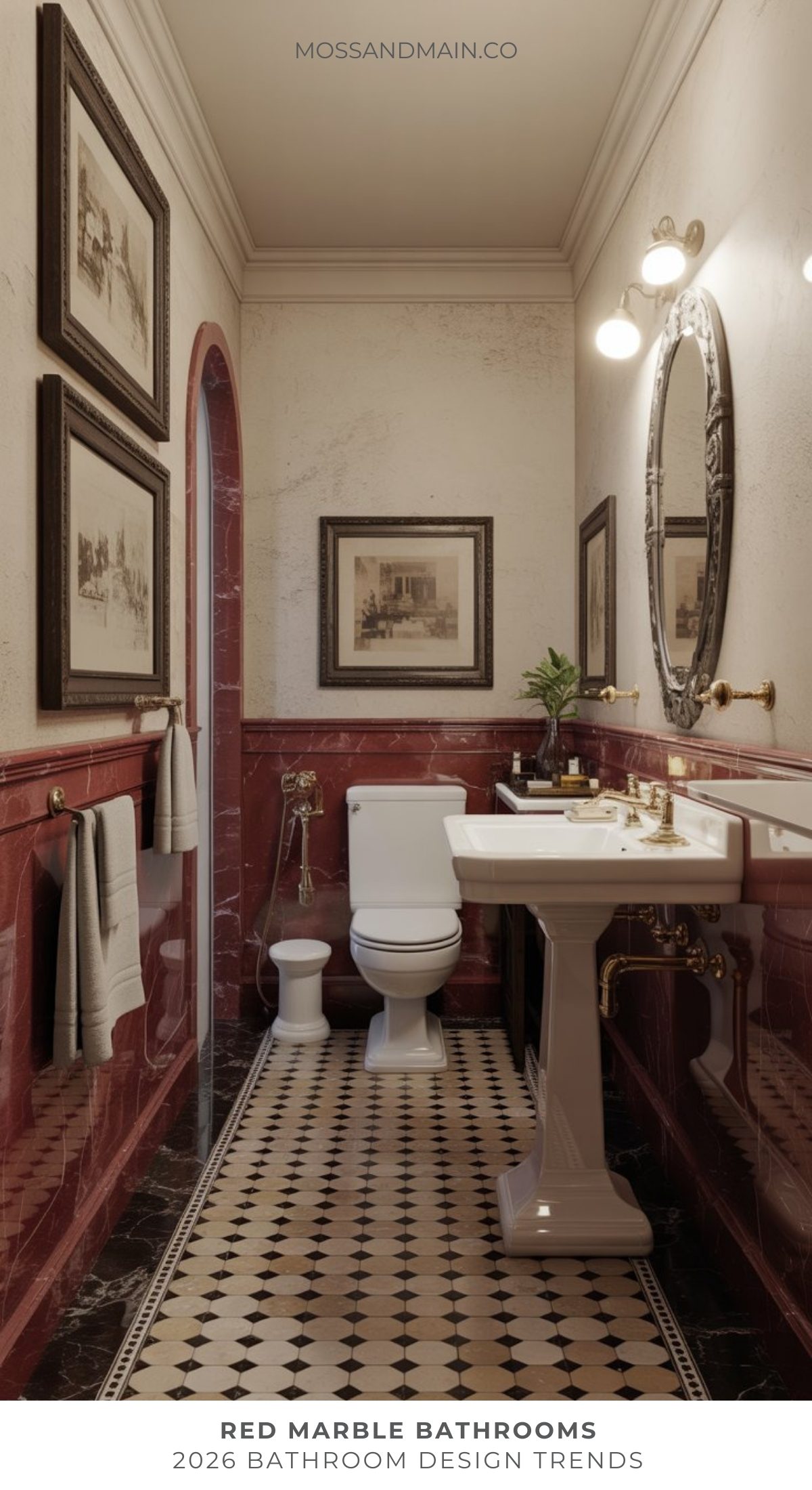 A narrow red marble bathroom showcases a bold bathroom trend with its striking walls, white toilet and pedestal sink, an oval mirror, vintage wall art, and black-and-white checkered floor tiles under warm lighting.