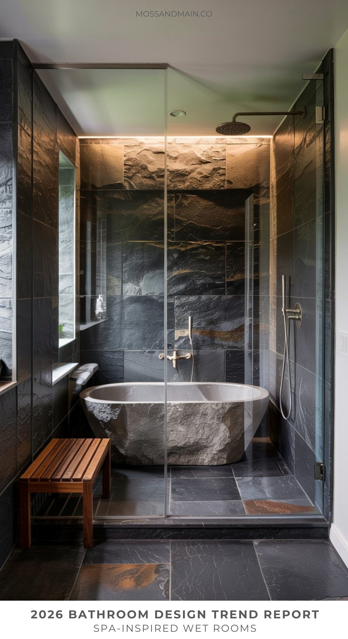 Modern bathroom with dark stone tiles, glass-enclosed shower, a large stone bathtub, rainfall showerhead, wooden bench, and soft indirect lighting—this dream bathroom captures Pinterest inspiration and sets the tone for bathroom trends 2026.