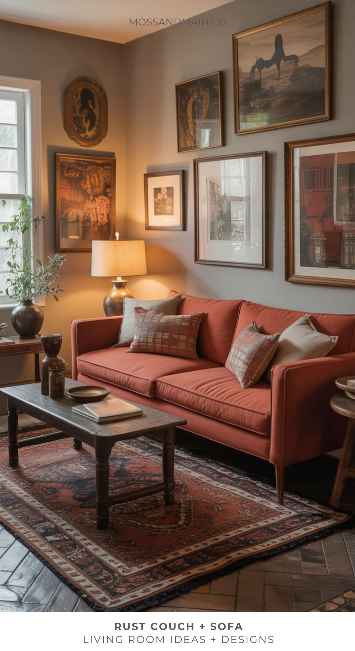 A cozy rust couch living room featuring a rust-colored sofa, patterned rug, wooden coffee table, and framed artworks. Warm lighting and neutral tones create a welcoming atmosphere.