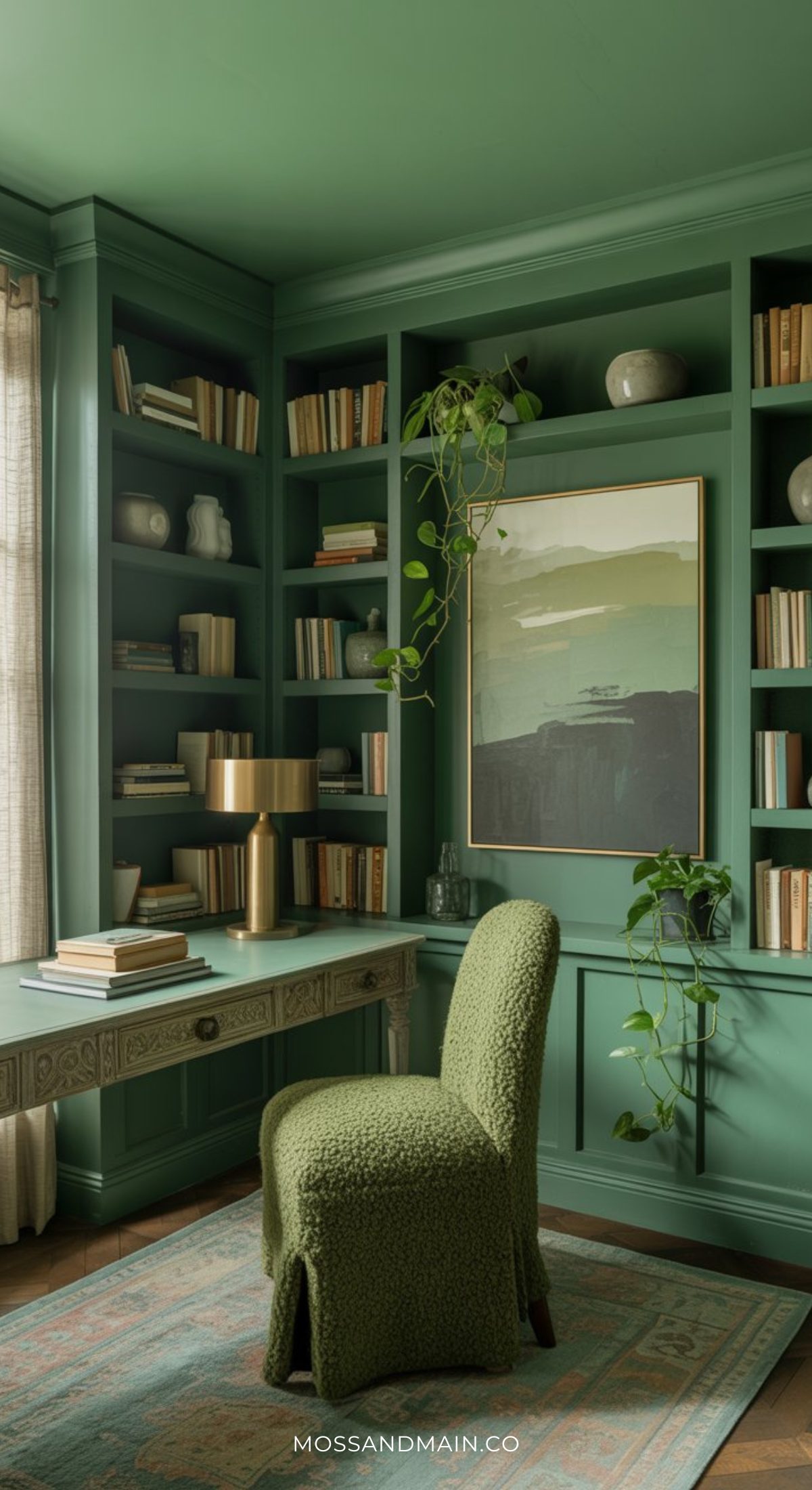 A cozy green home office reflects the psychology of color, with built-in bookshelves, a patterned desk, a textured chair, modern lamp, potted plants, and framed art. Sunlight filters through sheer curtains in this soulful home space designed for 2026.