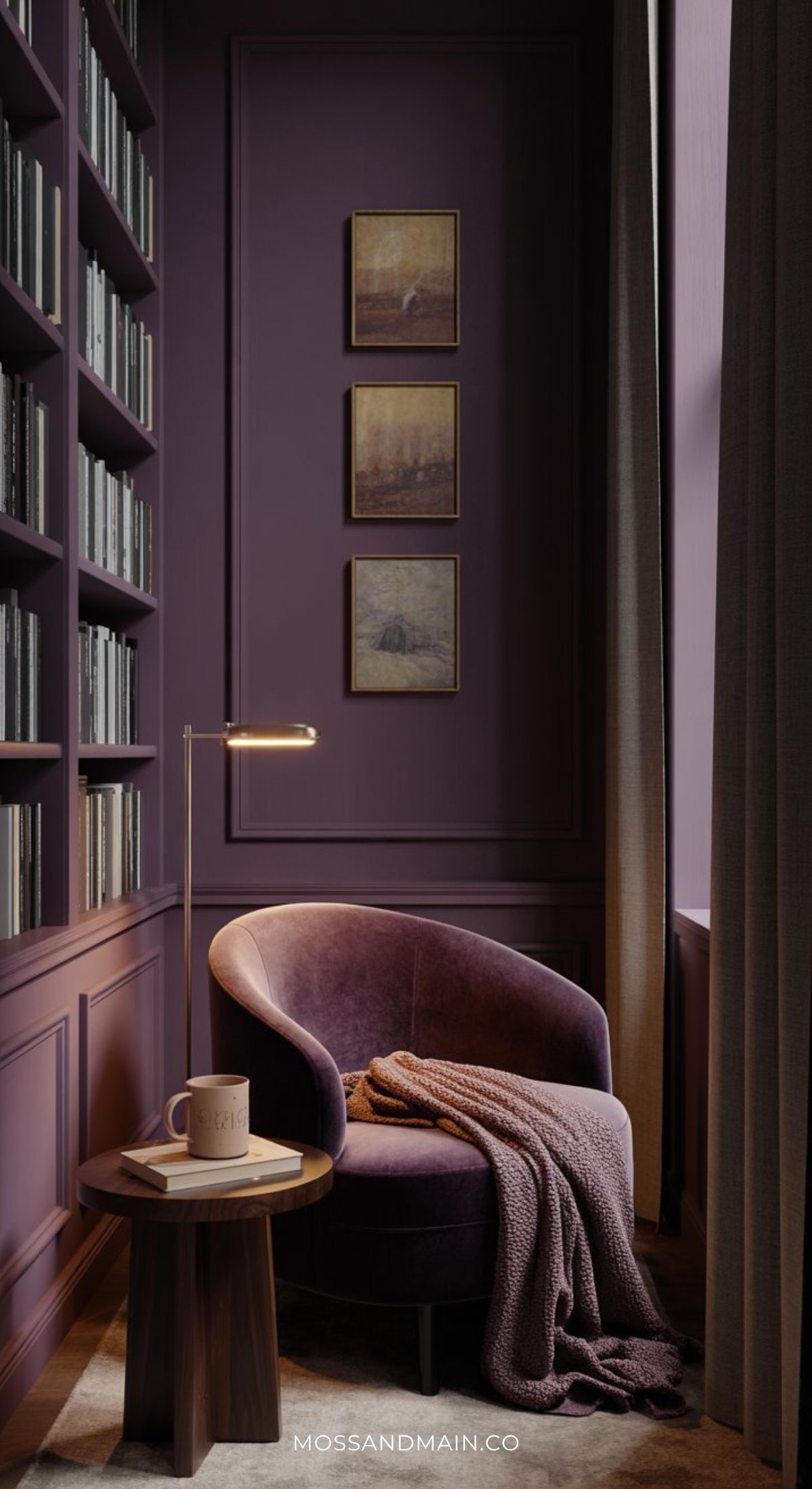 A cozy reading nook with a curved purple armchair, a mauve knit blanket, and a mug on a small wooden side table. Embracing the psychology of color, purple paneled walls and bookshelves create a soulful home aesthetic for 2026.