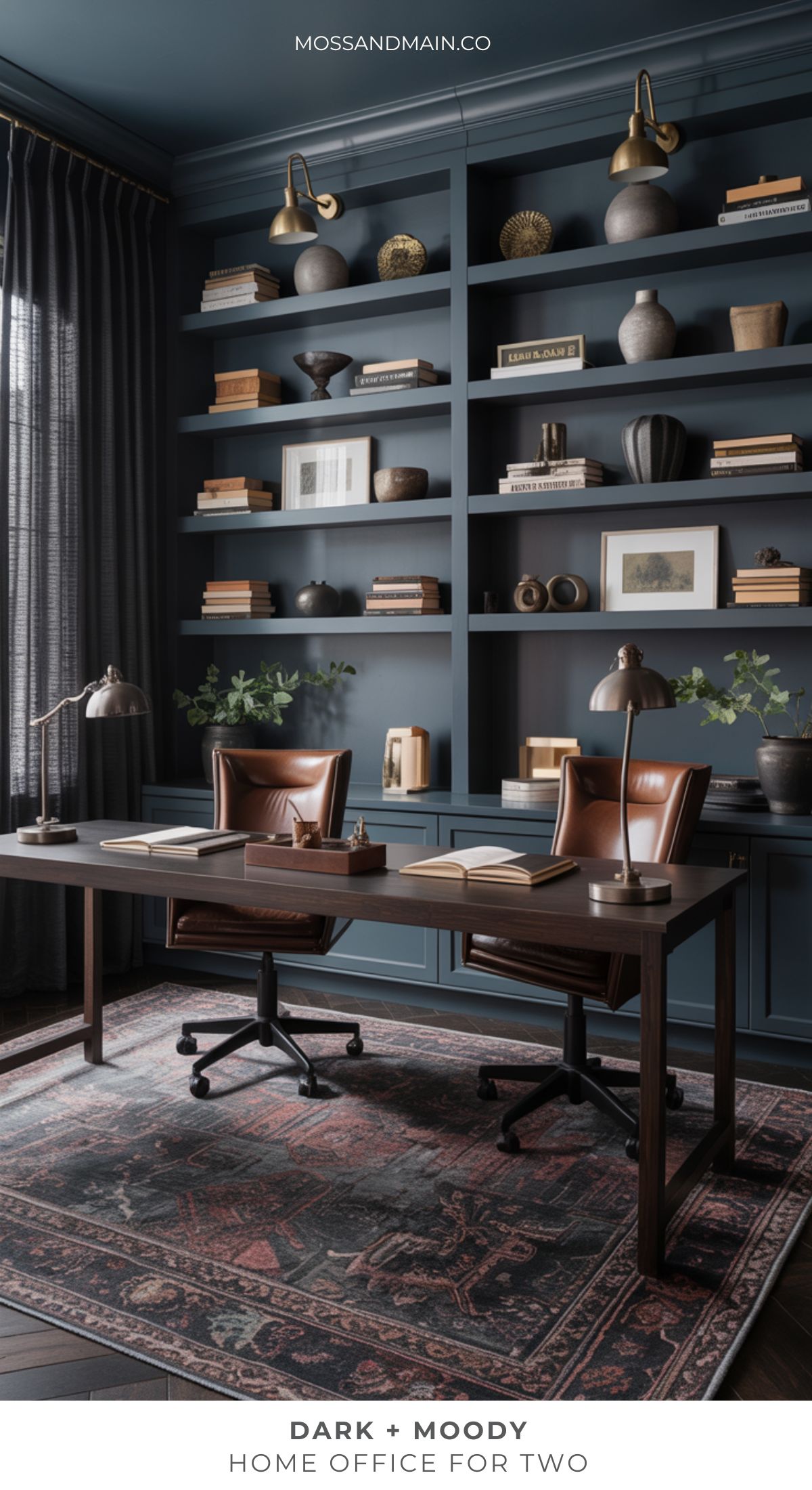 A stylish moody home office for two with dark blue walls, built-in shelves, brown leather chairs, a wooden desk, brass sconces, and a patterned rug creates a dark and moody atmosphere—perfect for unique home office ideas.