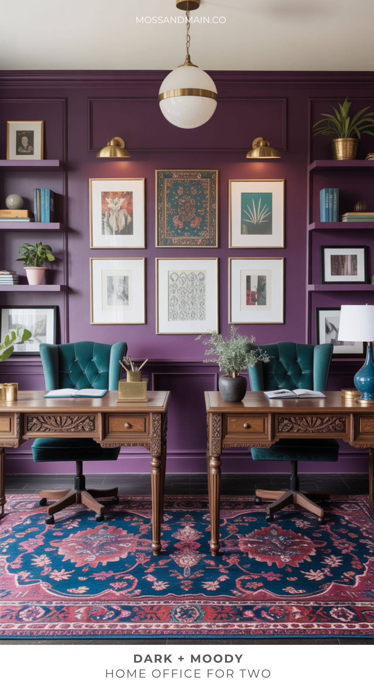 A stylish moody home office for two featuring dark purple walls, gold accents, green tufted chairs, wooden desks, and shelves with books and plants. Framed art decorates the wall above a colorful patterned rug.
