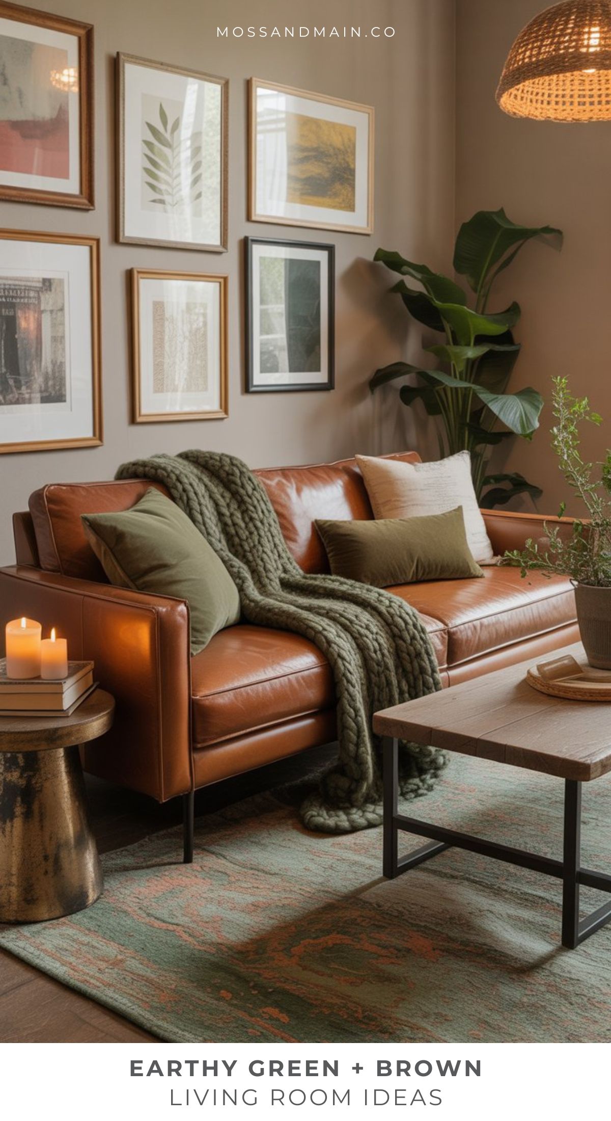 A cozy living room featuring a brown leather sofa, green pillows, a chunky throw, lit candles on a side table, a large plant, and framed art—perfect inspiration for earthy living room ideas in warm brown and green tones.