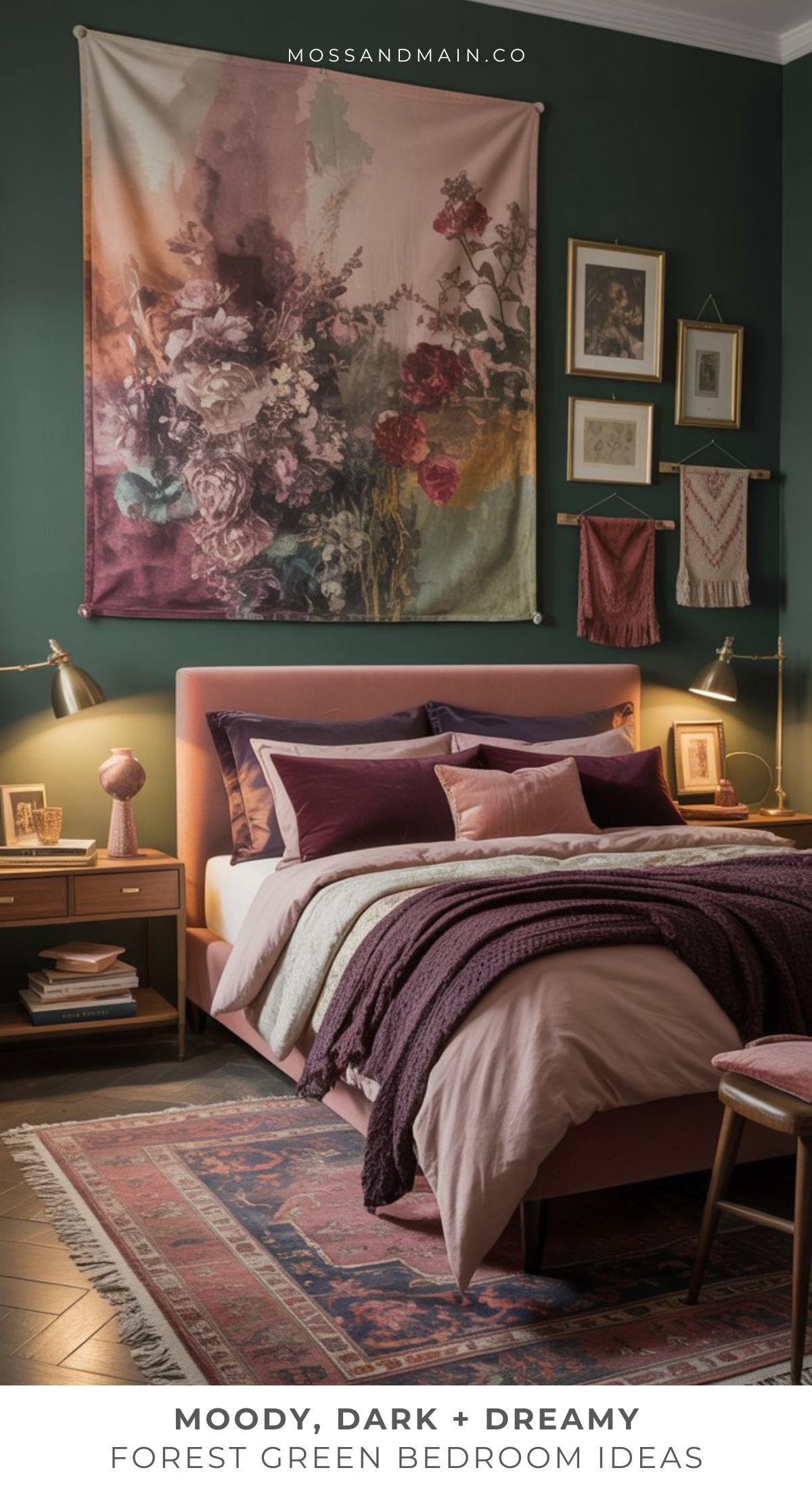 A cozy bedroom with forest green walls, a mauve bed with layered blankets and pillows, gold lamps, wooden nightstands, an ornate rug, and a floral wall tapestry—perfect inspiration for fans of dark moody rooms and designer catalog style.