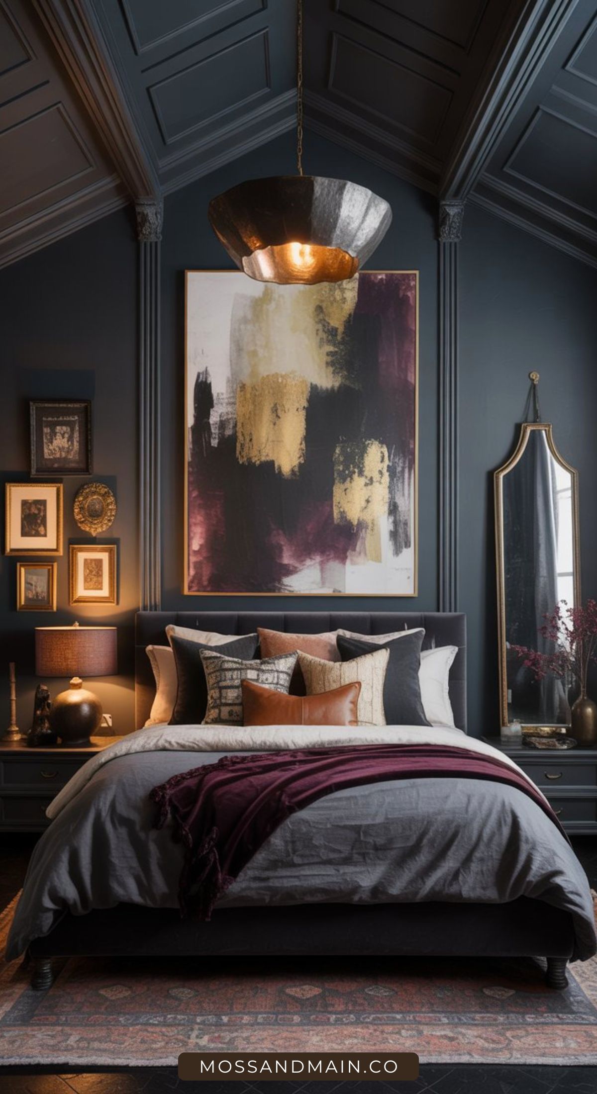 A stylish, color-drenched bedroom with dark walls, a large abstract painting above the bed, mixed pillows, cozy blankets, a modern chandelier, framed pictures, and a tall mirror creates a luxurious and inviting atmosphere.