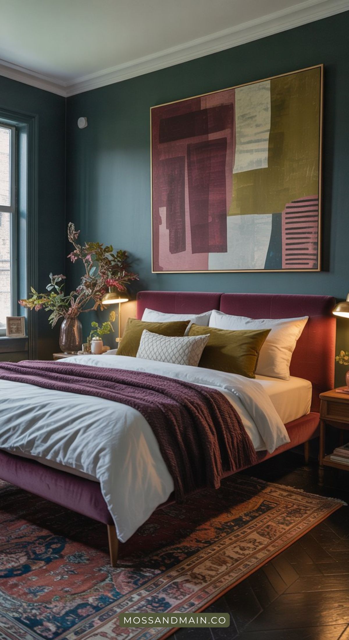 A stylish bedroom with a dark green color scheme, showcasing colors that go with dark green—burgundy, mustard, and white. Abstract artwork, wooden nightstands, cozy lighting, a patterned rug, and a vase with foliage complete the look.
