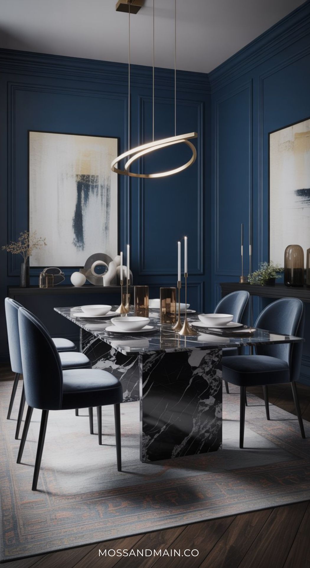 A luxe dining room featuring a black marble table, six blue upholstered chairs, gold and glass candle holders, abstract wall art, and a sleek circular pendant light set against deep blue paneled walls.